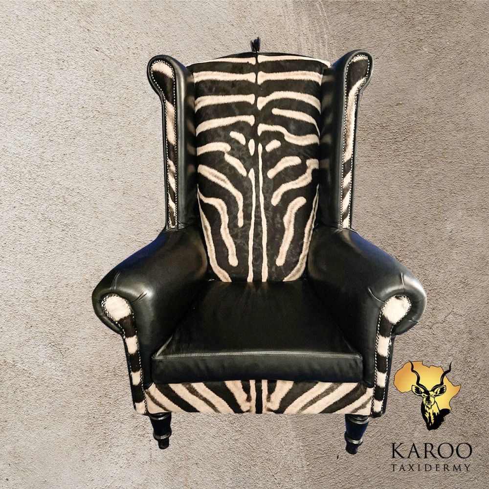 Burchell&rsquo;s Zebra Hide and Black Leather High-Back Wing Chair.
