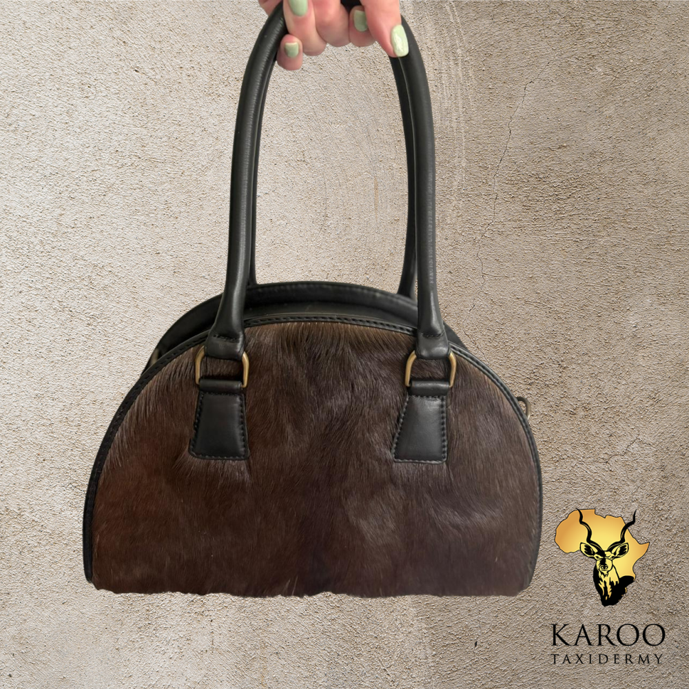 Over the Moon handbags in Black Impala